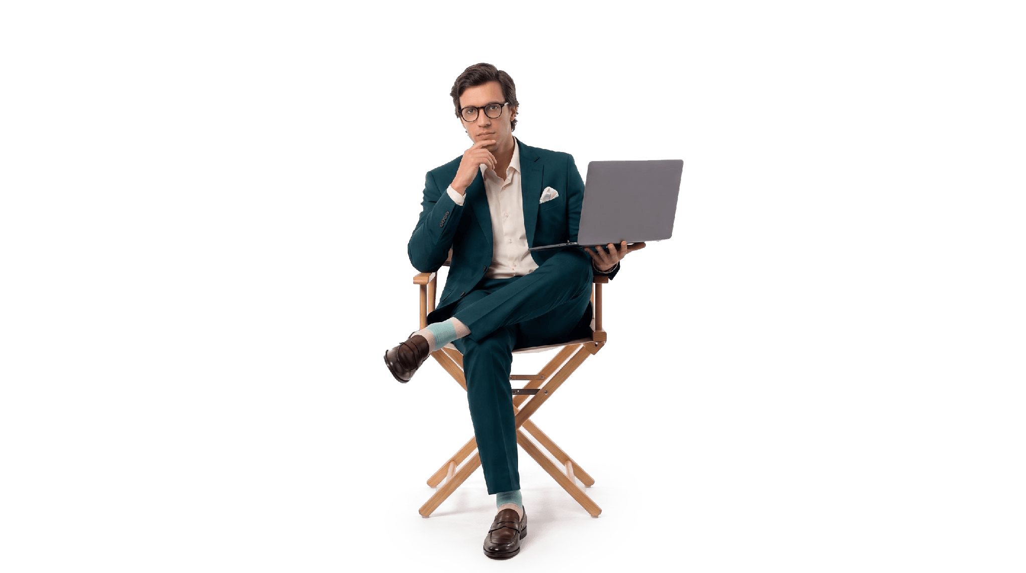 Director sitting with laptop